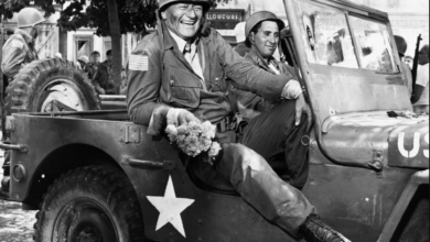 Photo of John Wayne and R. Lee Ermey Once Appeared in a Coors Light Beer Commercial Referencing 2 Iconic War Movies